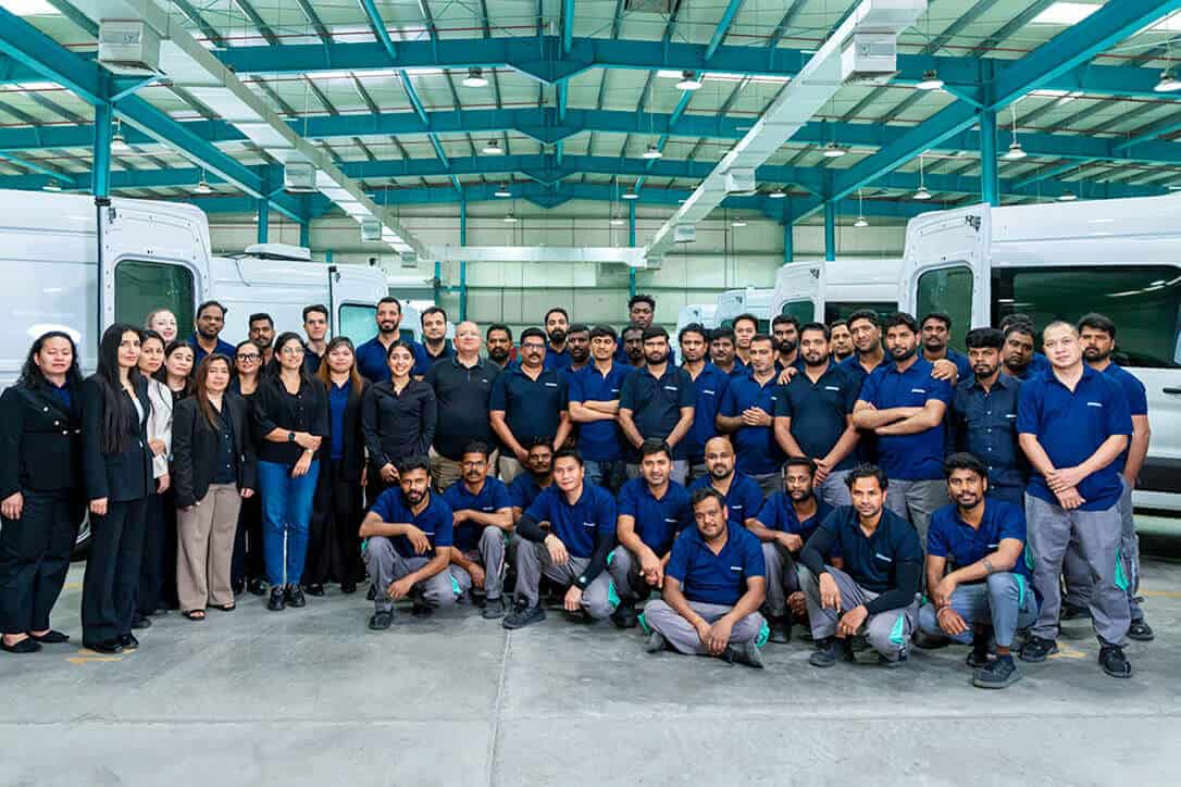 Production management team inside facility.